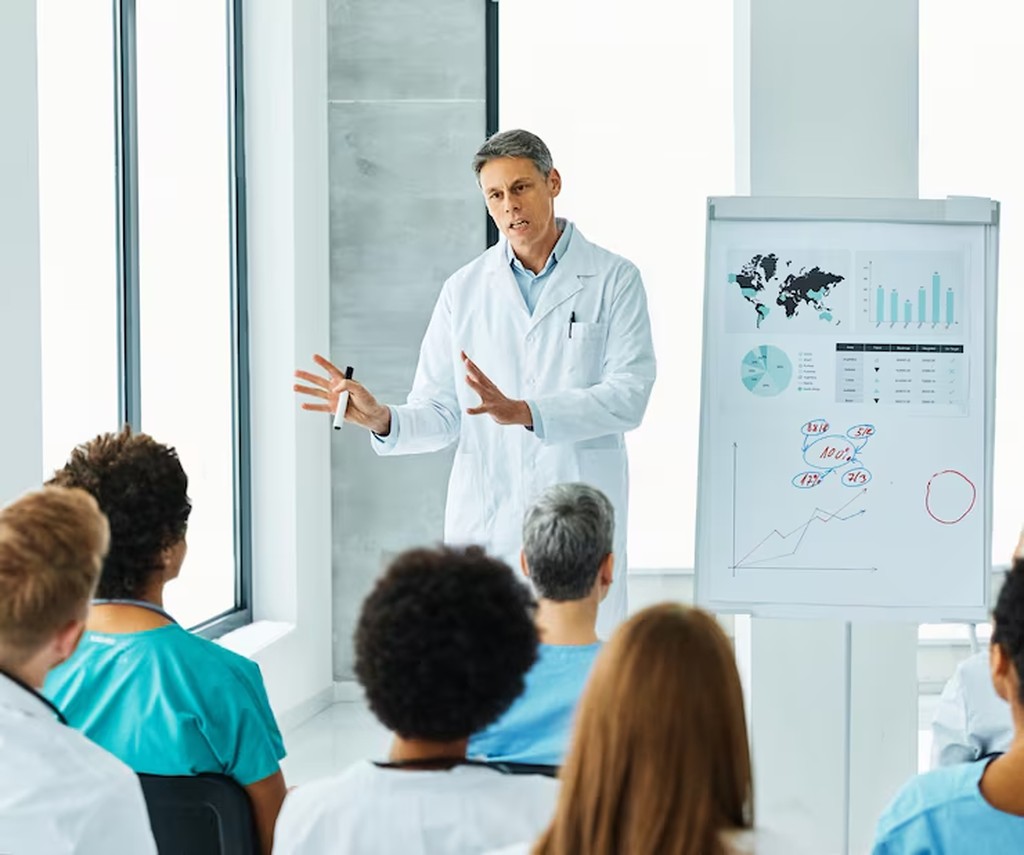 Doctor leading a training session for the clinic team